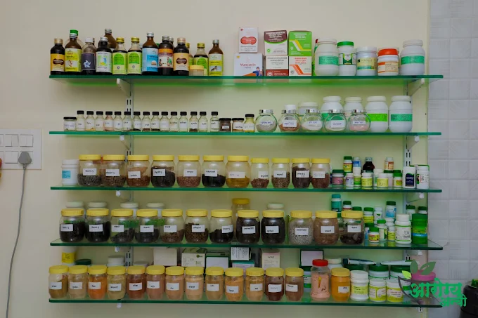 Ayurvedic herbs and medicines arranged inside the clinic